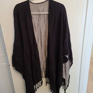 Reversible tommy Bahama shawl.